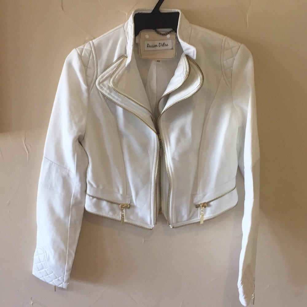 White leather coat with gold zipper detail